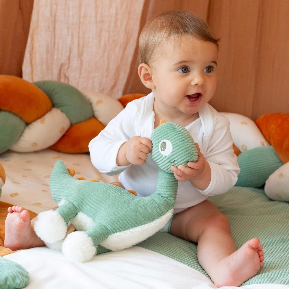 Peluche musicale dino